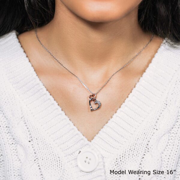 Sterling Silver Cascading Dual Heart Diamond Accented Pendant (.02 cttw) - Image 2